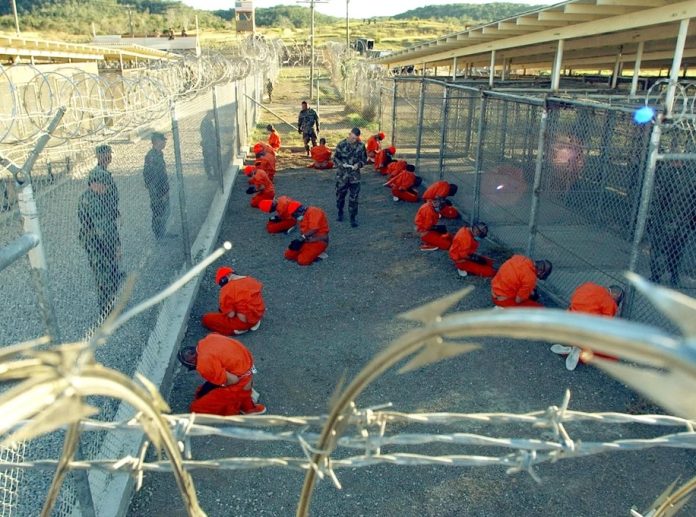 An image of detainees at GITMO as Trump orders 30,000-bed mass detention camp at Guantánamo for migrants